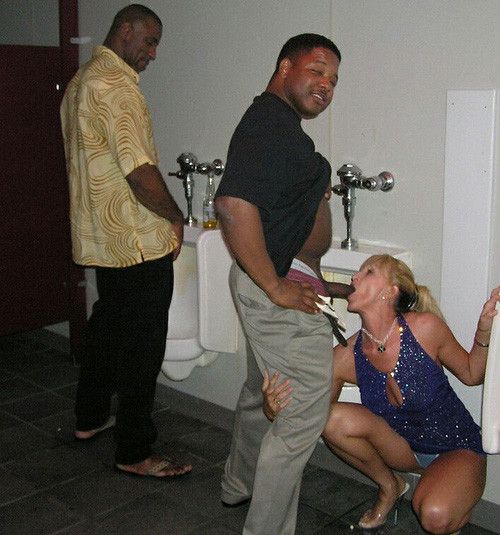 Amateur slut wife sucks a black cock in public restroom