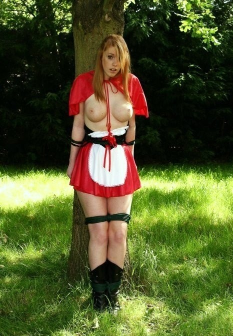 Little red riding hood tied up by the big bad wolf