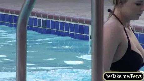 Dude spies on a busty babe on the pool