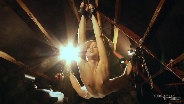 Suspended, the touch of the next whip is so arousing for this slutty slave. Maybe now she will learn to submits.