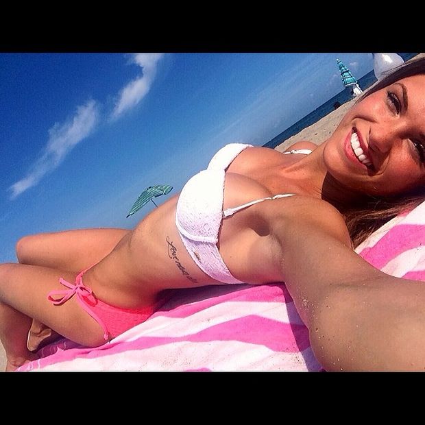 sunbathing by the beach