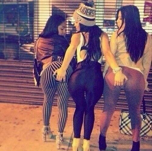 Three friends in yoga pants