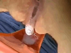dripping a big load of cum into her panties