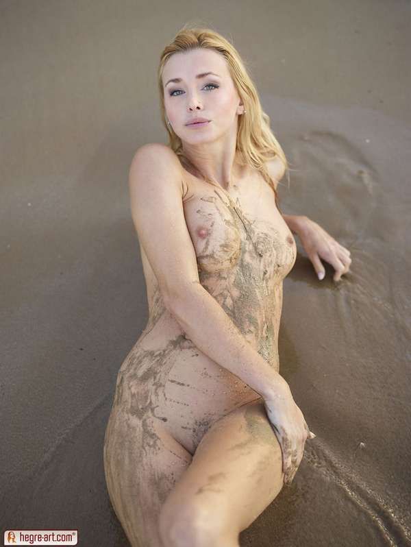 Coxy Playing with sand