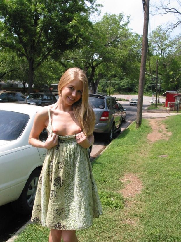 Flashing her cute little boobs in the front yard