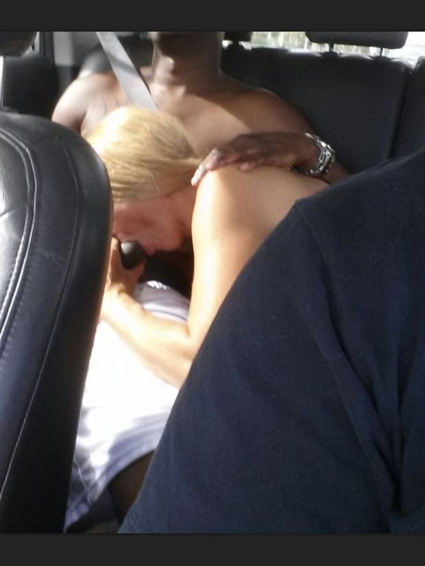 Sucking black man in backseat