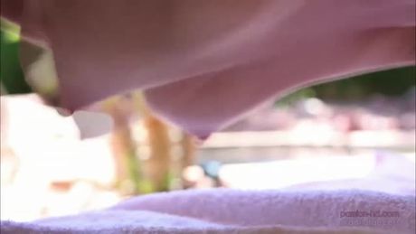 In a sunny day Lily Love is having her sun bathing beside the pool. The gardener from next door is watching her hot body. He teases her.