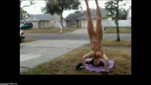 Webcam girl does naked handstand on her front lawn!!