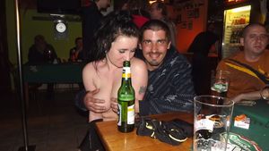 Busty stripper makes a show of in a pub