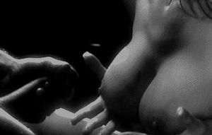 A perfect shot of cum on a perfect pair of tits