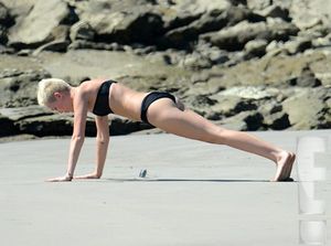 Miley Cyrus yoga butt poses
