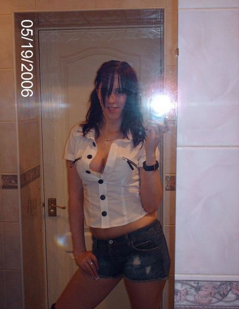 Sexy Brunette Taking A Selfie