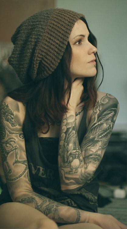 Sad emo babe tattoo in beautiful picture with alot of tattoos on the body