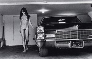 Naked girl and old school Cadillac