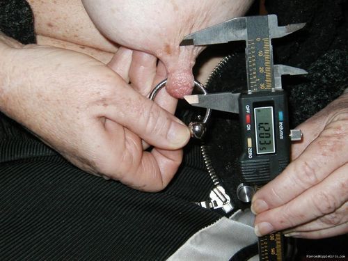 piercednipplegirls:long pierced nipple!can anybody read the micrometer?? post your answer