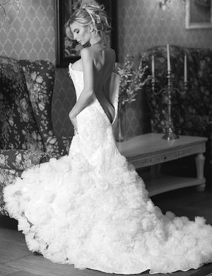 fine blonde ass with nice tits peeking out of unzipped white rose wedding dress