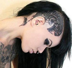 Black-haired teen’s inked head