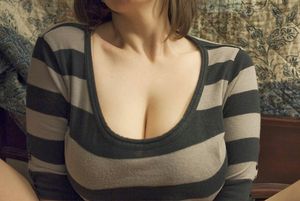 big natural brunette breasts in striped shirt