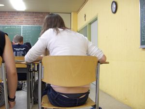 Visible thong during lecture