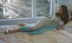 big mature brunette breasts in blue see through lingerie