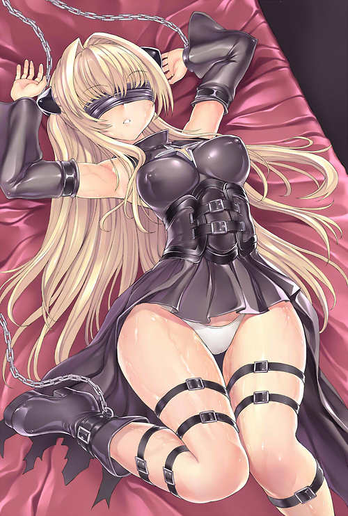 round blonde tits chained in leather with blindfold