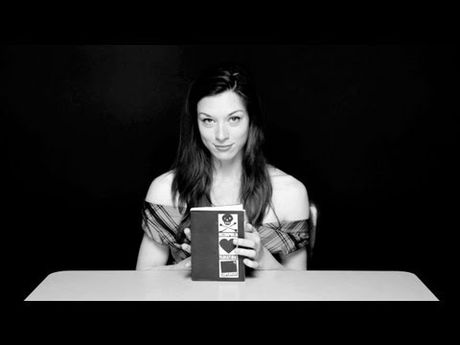 Stoya reading with a vibrator