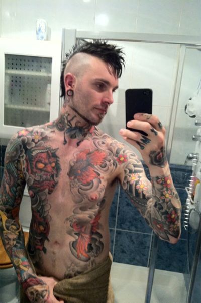 hot guy with a mohawk & tattoos