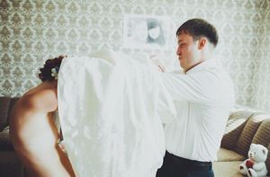 Helping bride get ready for big day.. And nice nipple