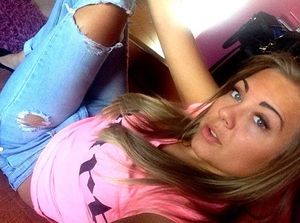 nice girl with ripped trousers