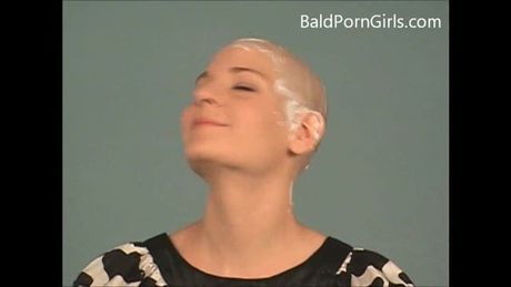 Cute bald-headed chick sucks big dick