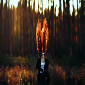 Long red hair on fire