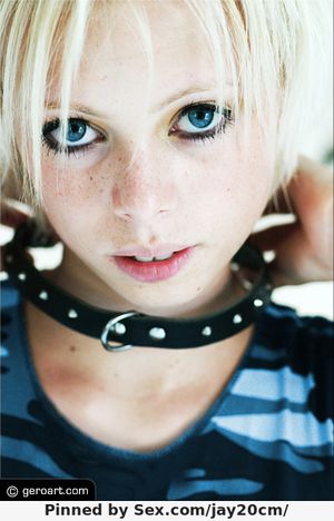 Putting her collar on for a night on the town... what acutie eh?