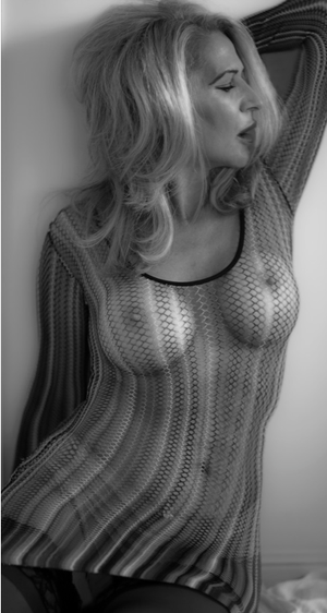 mature blonde fake round tits in see through dress