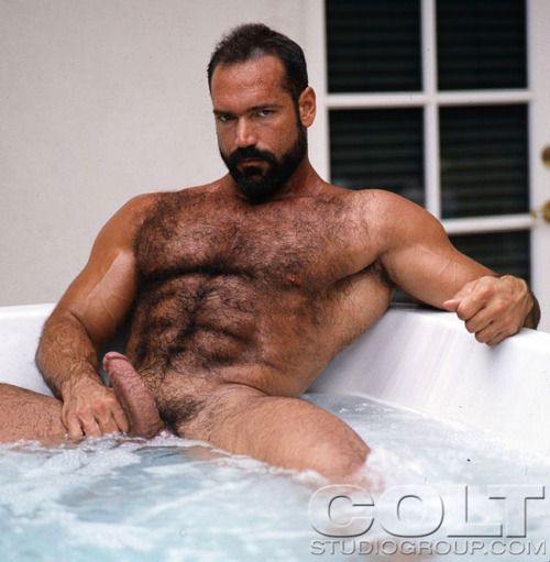Hairy man in tub