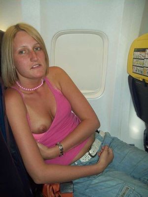 cute one boob on a plane