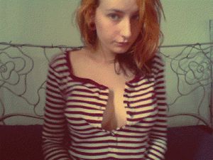 cute round redhead teen tits exposed and squished