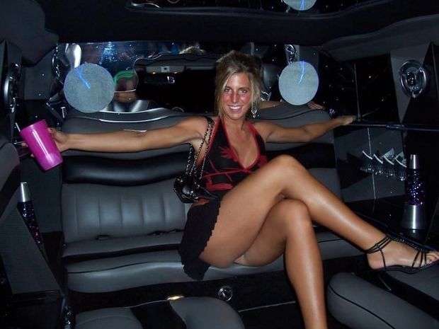 Leggy girl sits on a bench