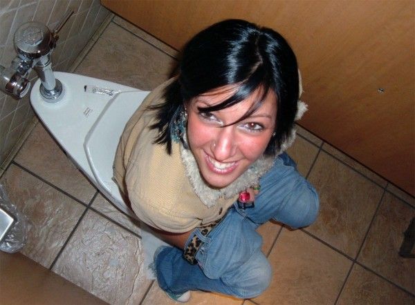 Brunette girlfriend caught peeing