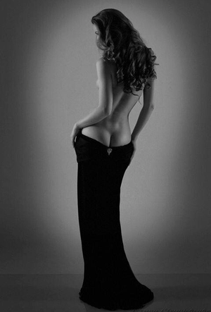 round brunette ass and sweet tits coming out of black dress