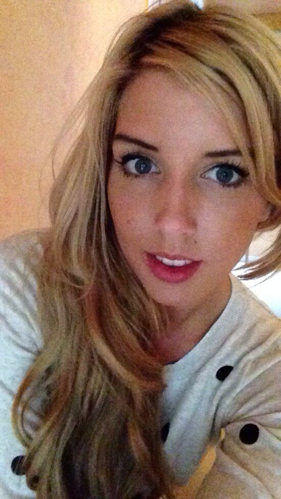 Beautiful blonde girl with blue eyes and pretty face