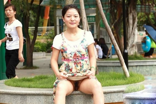 chinese maid goes commando in public park