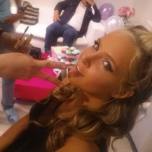 hot babe doing makeup.