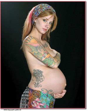 tattooed preggo redhead