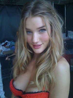 celebrityskin:Rosie Huntington-Whiteley slipping a lil’ nip