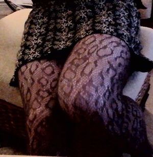 patterned nylons and skirt...nice legs