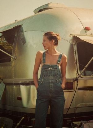 Overalls near her trailer