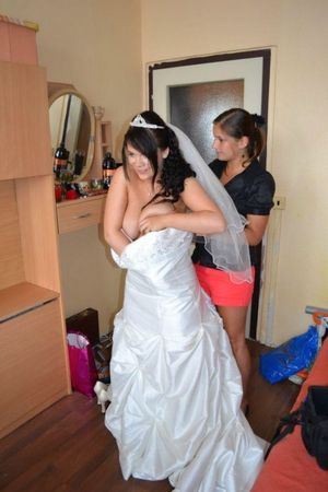 Putting big tits in her dress