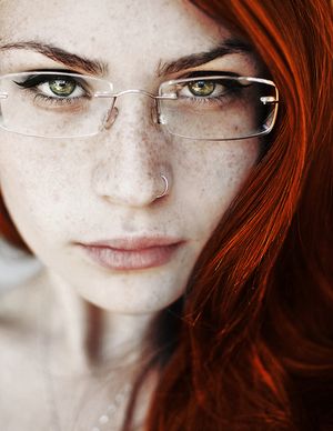Freckle girl in glasses