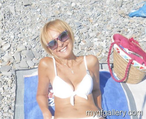 Blond milf on beach