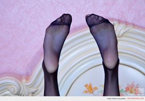 foxy-babe-slowly-slips-shoes-play-dildo-nyloned-feet